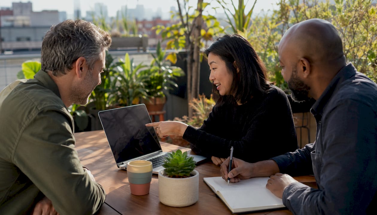 Team discussing AI digital advertising strategy